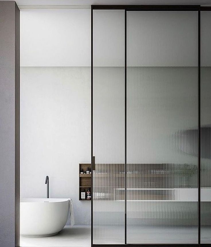 Fluted Glass Shower Partition installation at AL QUOZ DUBAI by Ahmad Glass Works