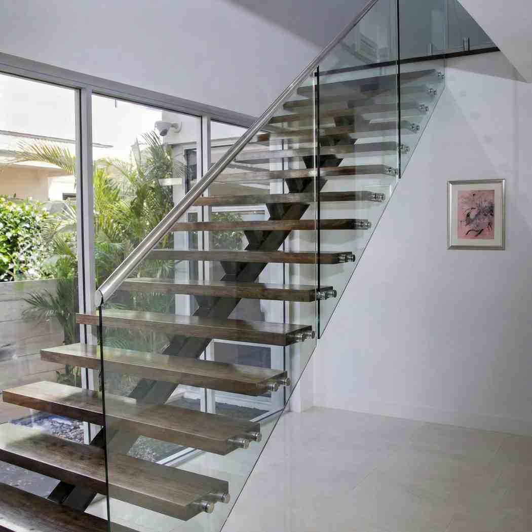 Staircase with stainless steel and glass railing installed in Al Quoz