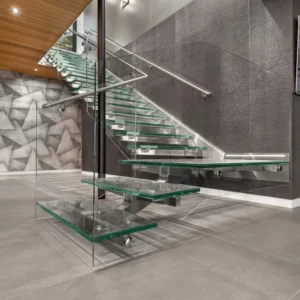 Floating glass staircase with frameless glass railing.