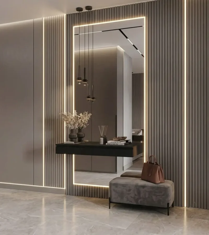 Large custom bedroom wall mirror installed in a modern home