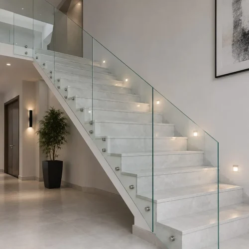 Modern frameless stair glass railing installation in Dubai with Tempered safety glass.